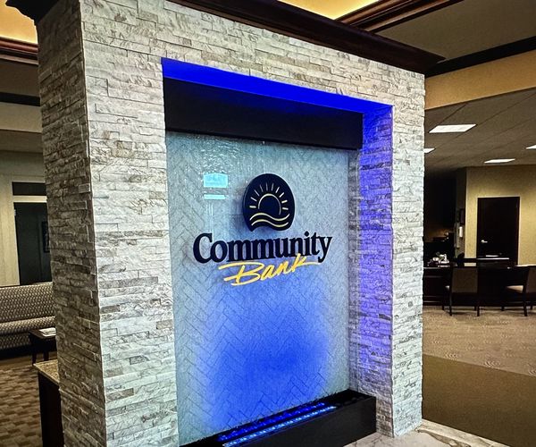 #050 Community Bank – Stone Liquid Wall