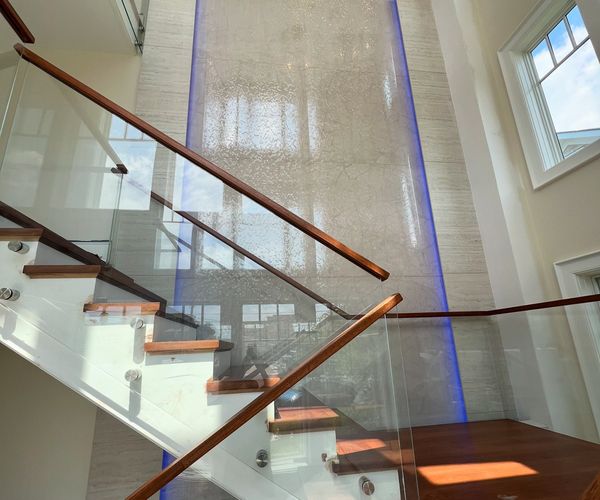 #053 Private Residence – Two-Story Staircase Liquid Wall