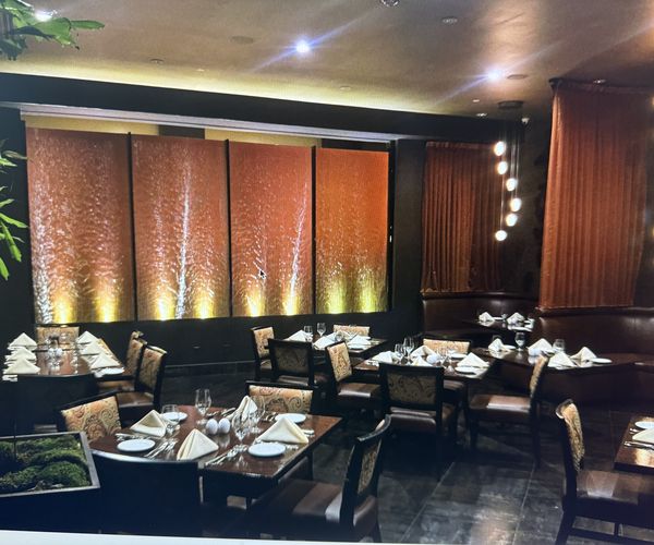 #056 Restaurant – Copper Rain Walls